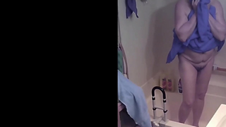 grandma looking good getting out of shower